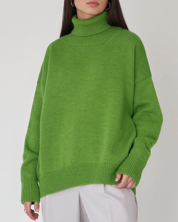 Ribbed hem women's oversized roll neck jumper, a warm & fashionable piece for cold days.