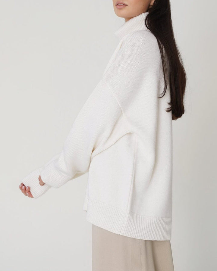 Warm oversized roll neck sweater for women, ideal for casual wear & winter fashion.
