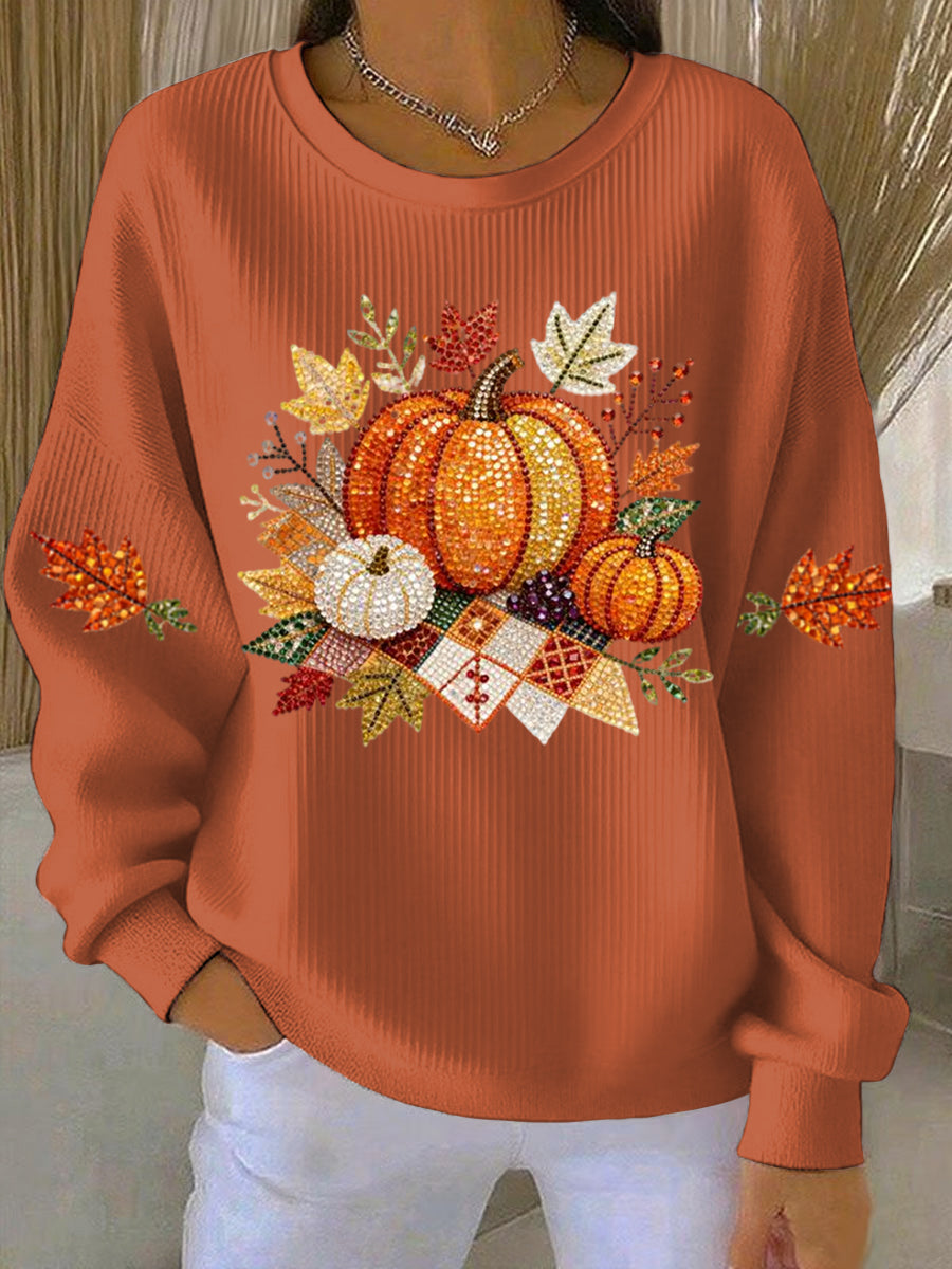 Women's cozy pumpkin graphic sweatshirt, long sleeve, round neck for fall fashion.