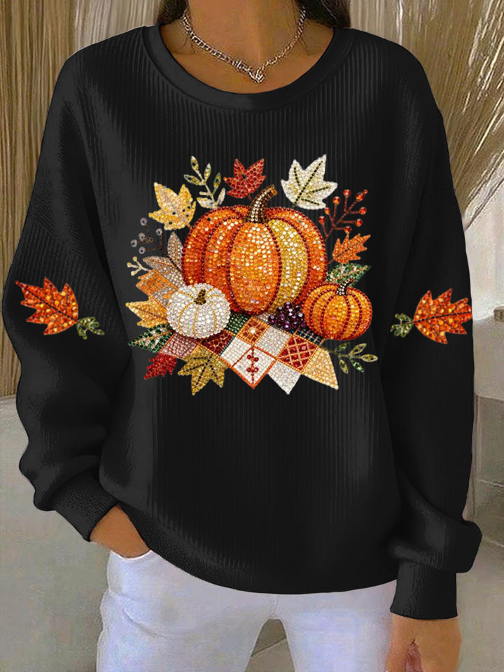 Comfortable women's pumpkin graphic long sleeve top, essential for fall style.