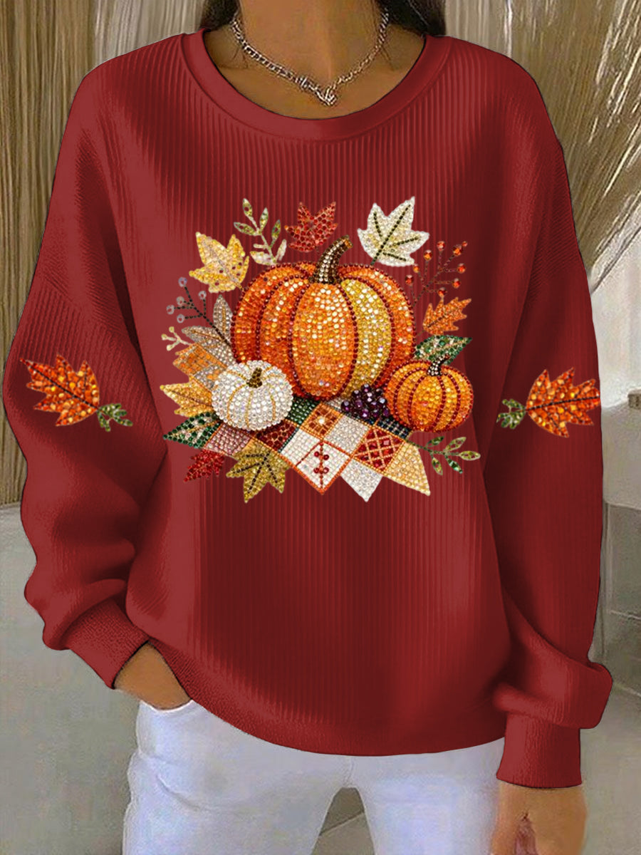 Women's autumn style sweatshirt with festive pumpkin graphic, ideal for cozy fall days.