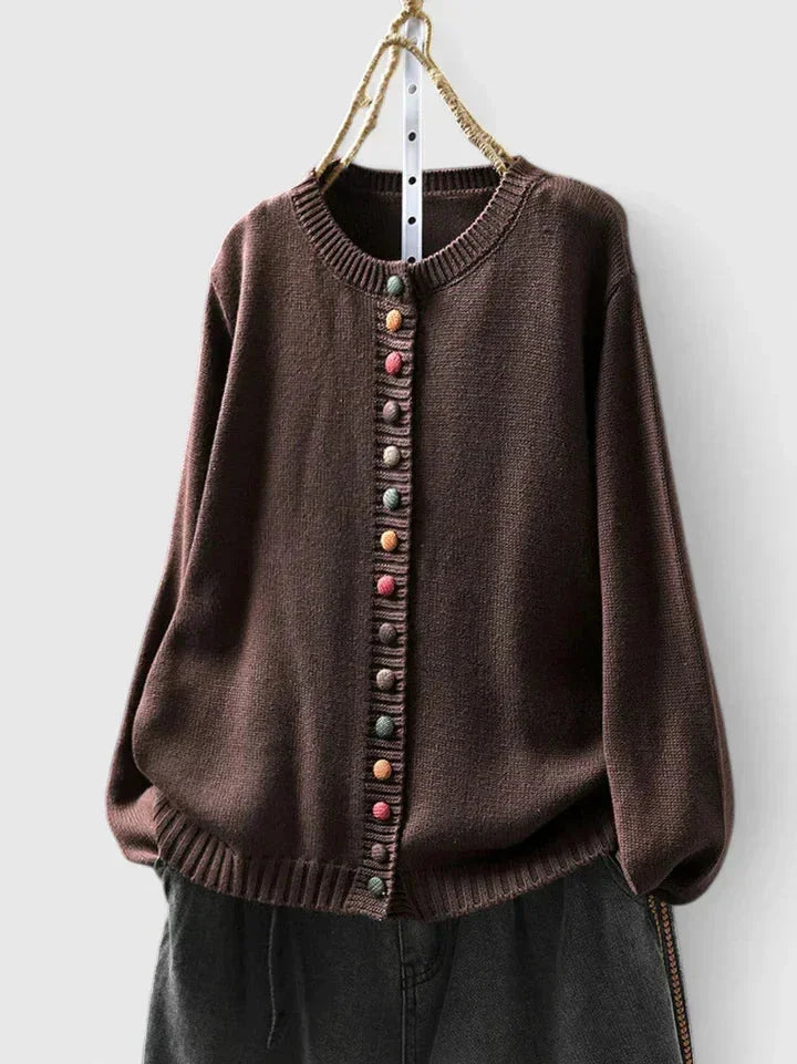 Casual women's button-front cardigan, relaxed fit with eye-catching multi-color buttons for versatile wear.