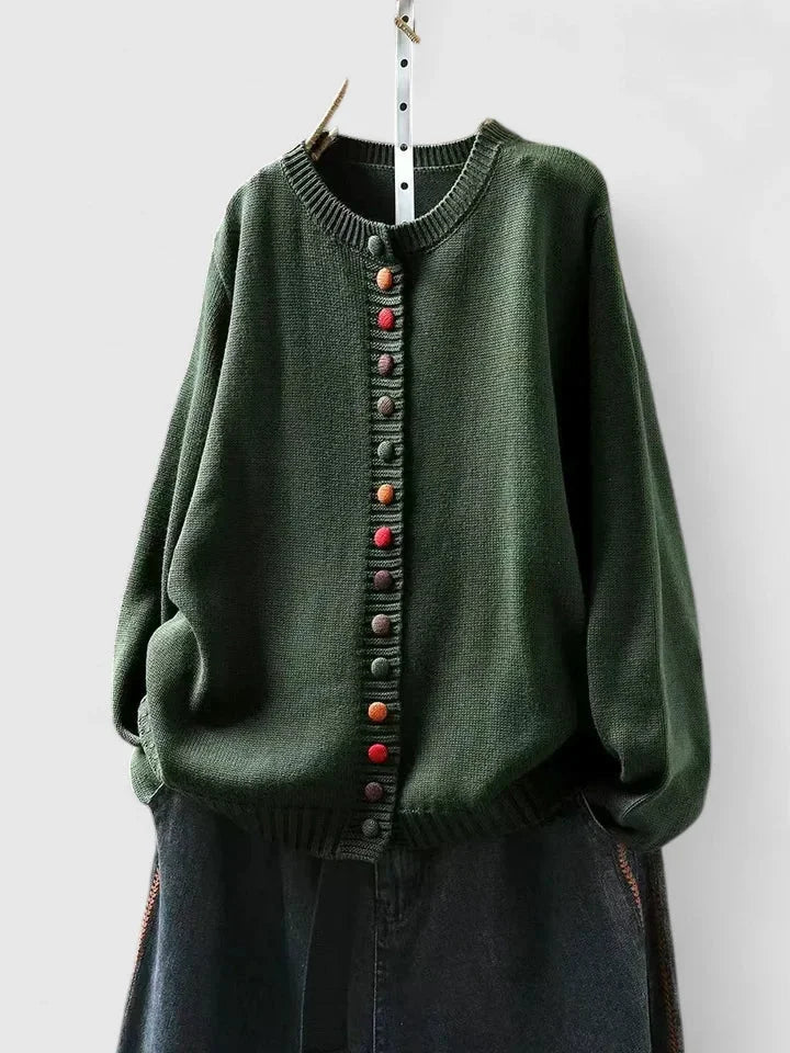 Warm & cozy women's cardigan sweater, relaxed fit perfect for fall/winter layering, styled with multi-color buttons.