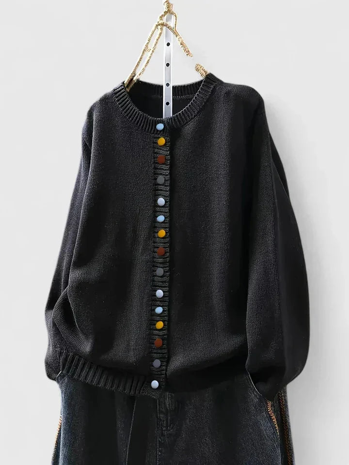 Comfortable women's relaxed-fit cardigan, soft knit sweater with chic multi-color buttons, great for any outfit.