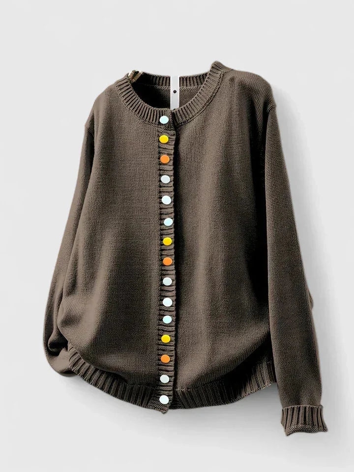 Stylish women's relaxed-fit cardigan sweater with multi-color buttons, a versatile piece for casual chic layering.