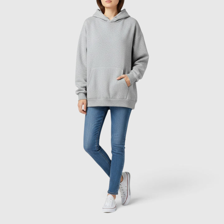 Oversized women's pullover hoodie with drawstring hood & front kangaroo pocket, ideal for relaxed everyday wear.