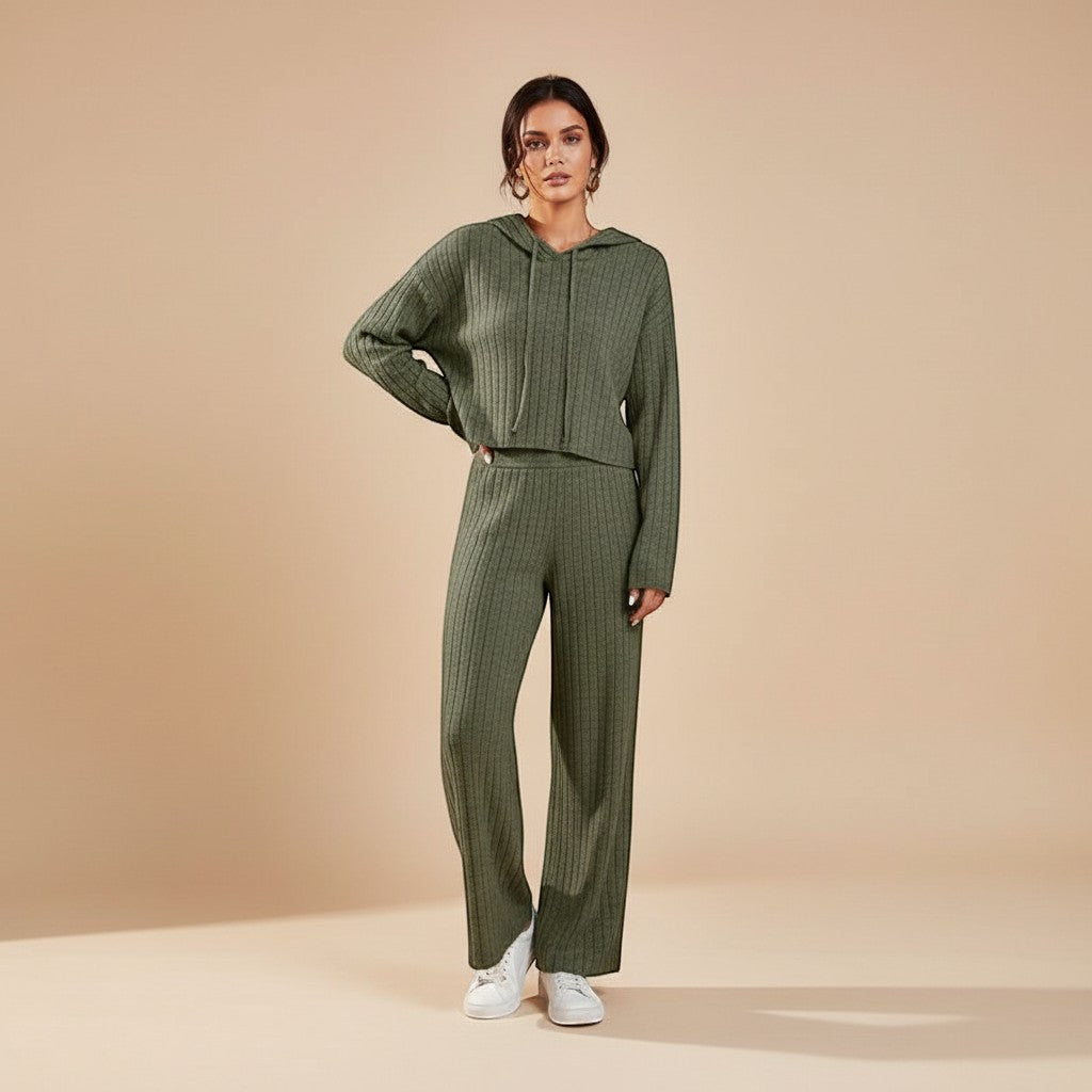 Women's cozy ribbed knit hoodie and relaxed pants set, perfect for loungewear or a casual travel outfit.