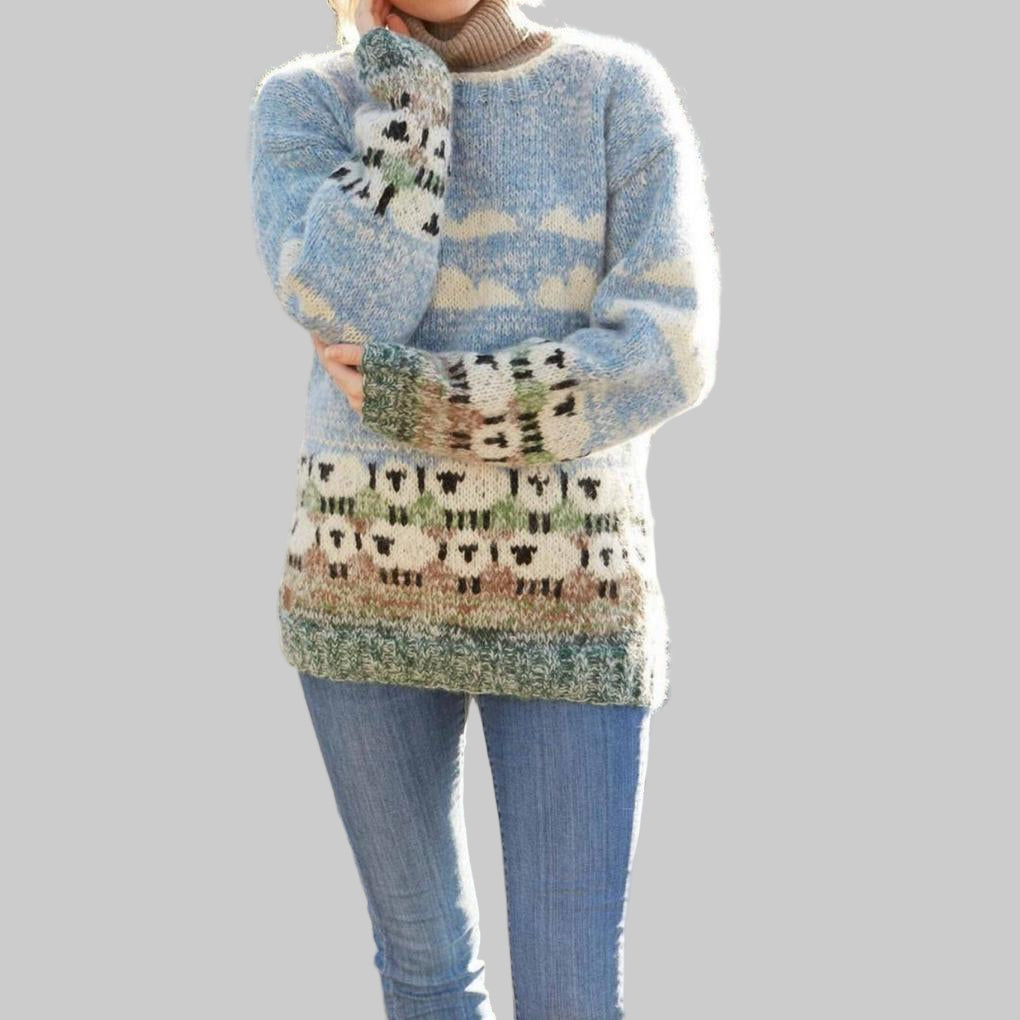 Women's cozy sheep print pullover sweater. Long sleeve, round neck, relaxed fit for playful winter fashion.