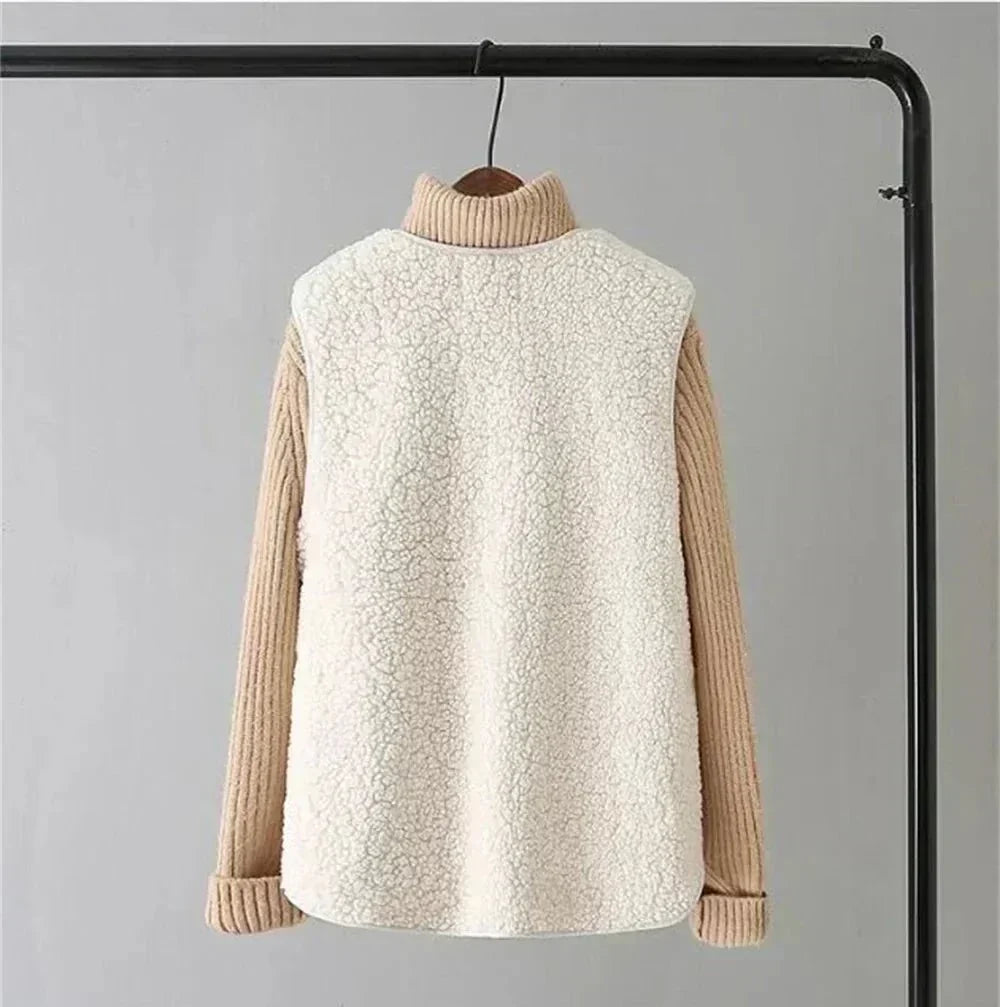Versatile women's layering vest, cozy and lightweight, essential for warm autumn outfits.