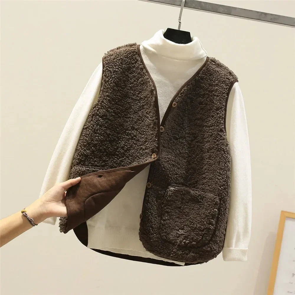 Women's cozy sleeveless vest, warm, lightweight, and comfortable autumn/winter layering essential.