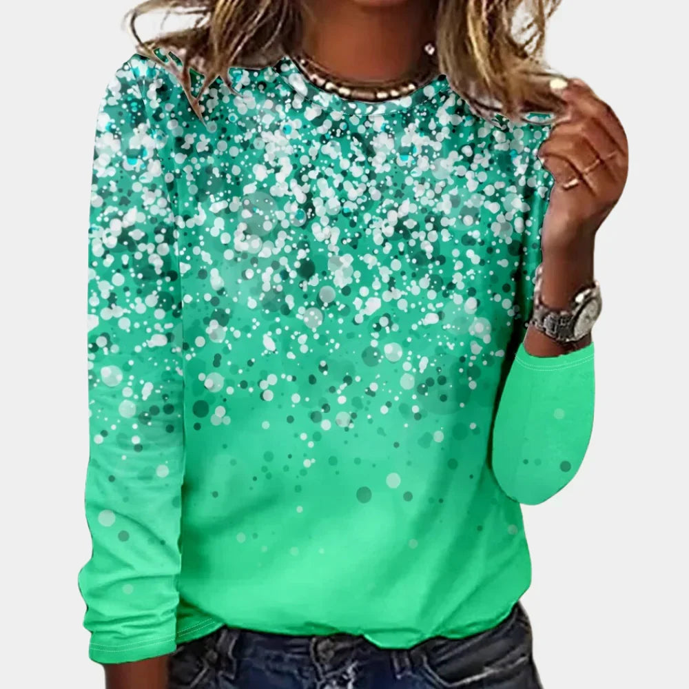 Chic women's long-sleeve crew neck sweater with elegant snowflake design for winter fashion.