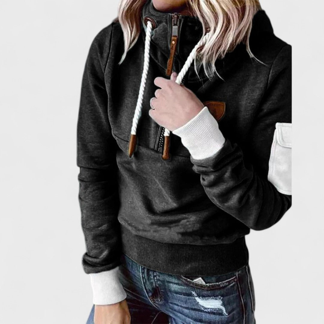 Stylish women's zip neck jumper in a soft, cozy knit. Long sleeve top, essential for winter comfort.