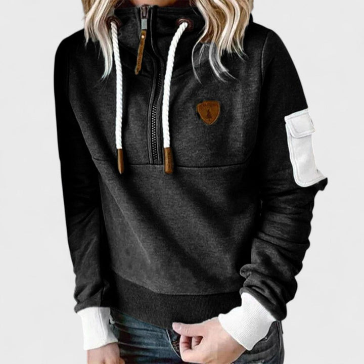 A warm women's cozy soft knit jumper with a practical zip neck. Long sleeve for everyday fall fashion.