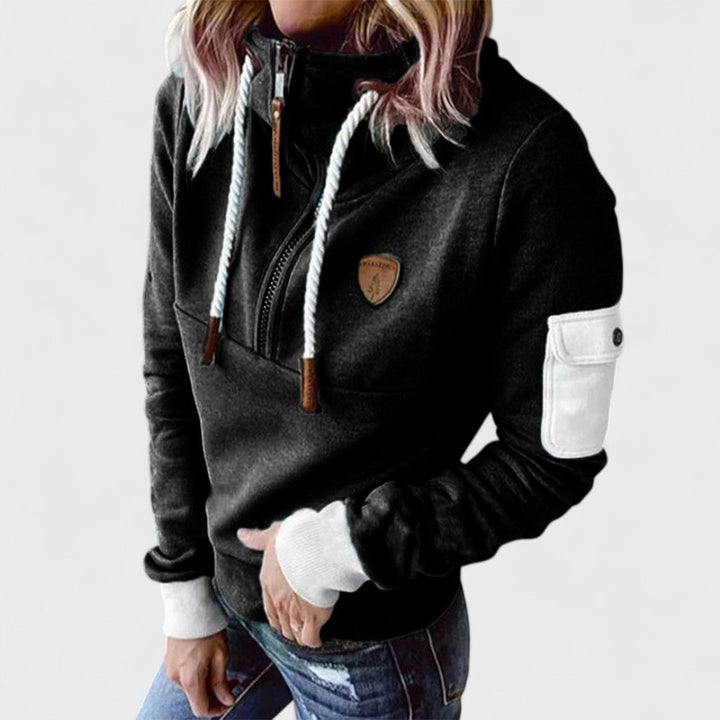 Women's long sleeve cozy knit jumper, featuring a modern zip neckline. Soft fabric, ideal for winter style.