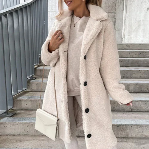 Women's cozy teddy coat with button-front and notched collar, perfect for winter warmth and style.