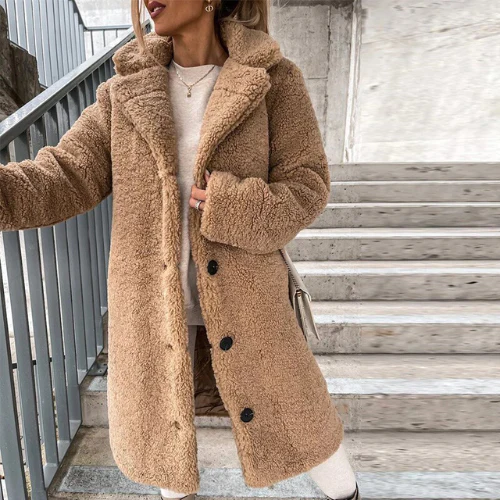 Warm women's teddy bear coat with a notched collar and button details, ideal for fall fashion.