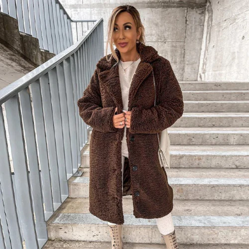 Fashionable women's teddy winter jacket, buttoned front, and classic notched collar for a chic look.