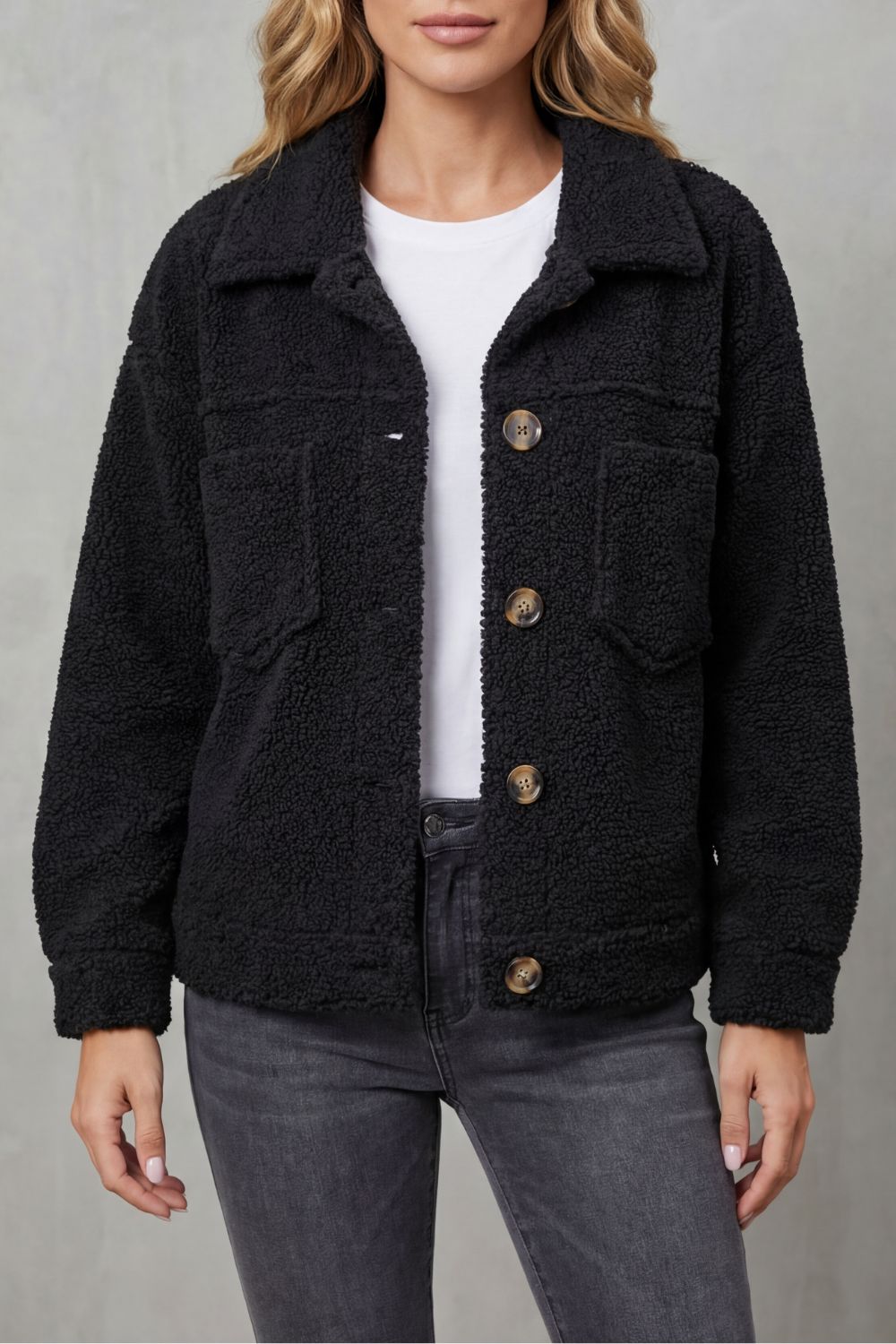 Women's cozy textured button-up jacket, perfect for stylish layering in spring or autumn.
