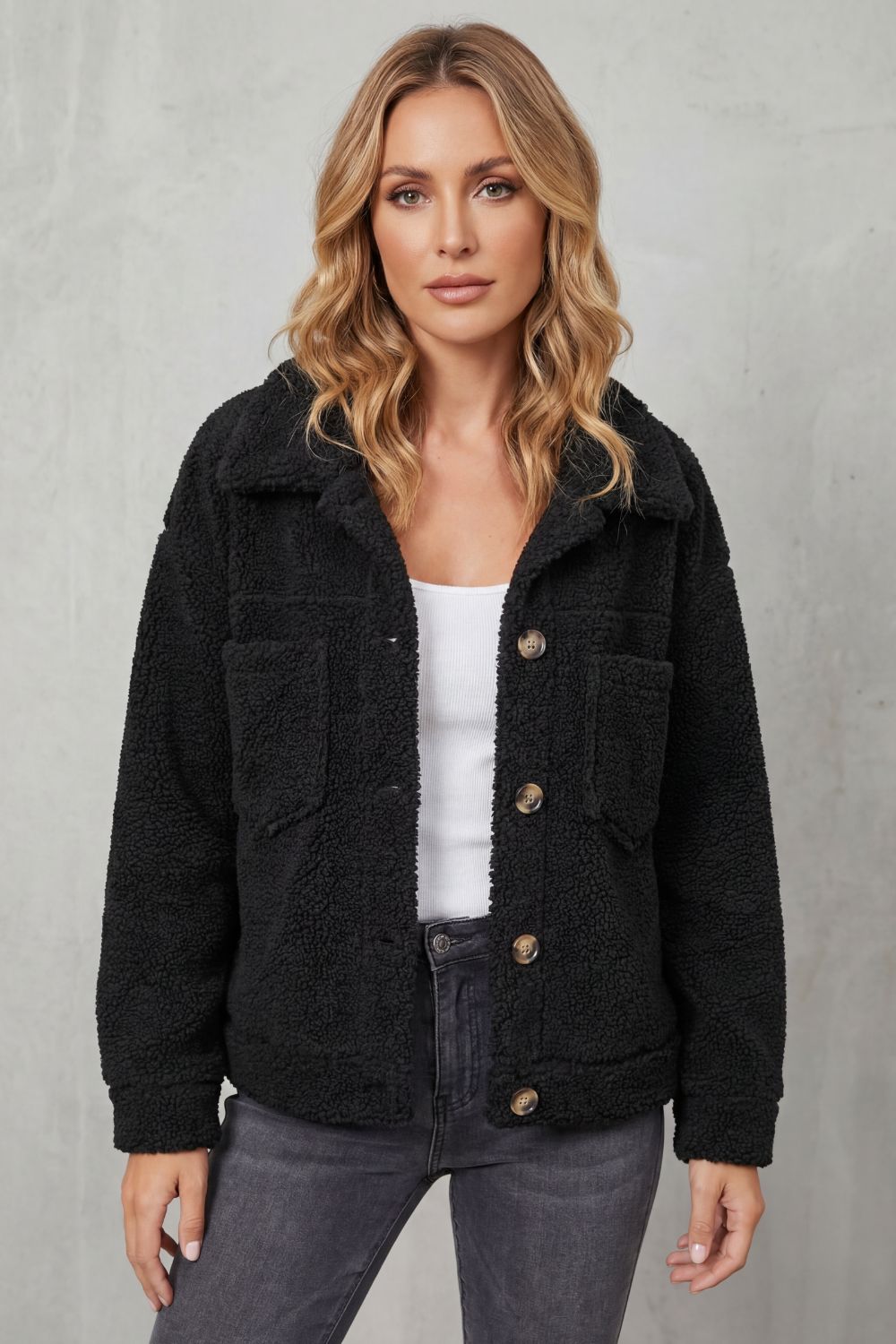 Stylish women's textured jacket with practical button-up front, ideal for versatile casual outerwear.