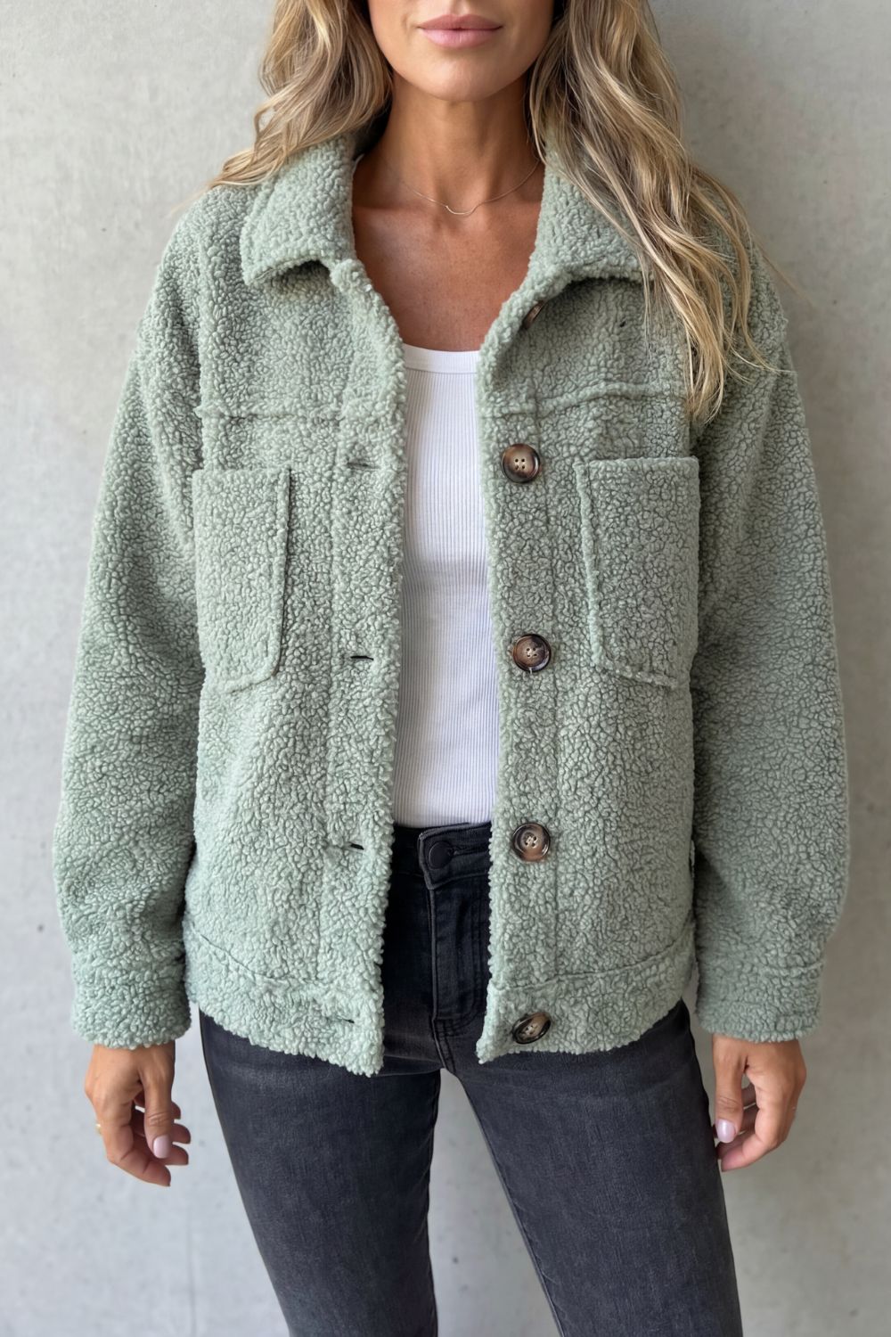 Warm women's button-up jacket with rich texture, a cozy layering essential for autumn & spring.