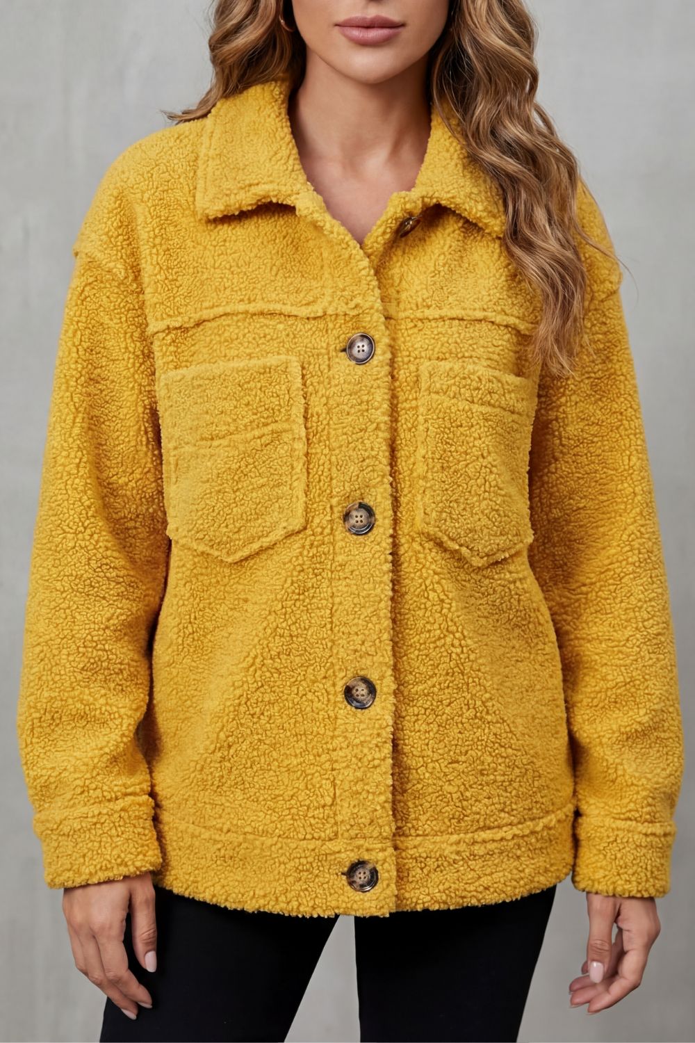 Versatile women's textured outerwear, a cozy & stylish button-up jacket for casual layering.