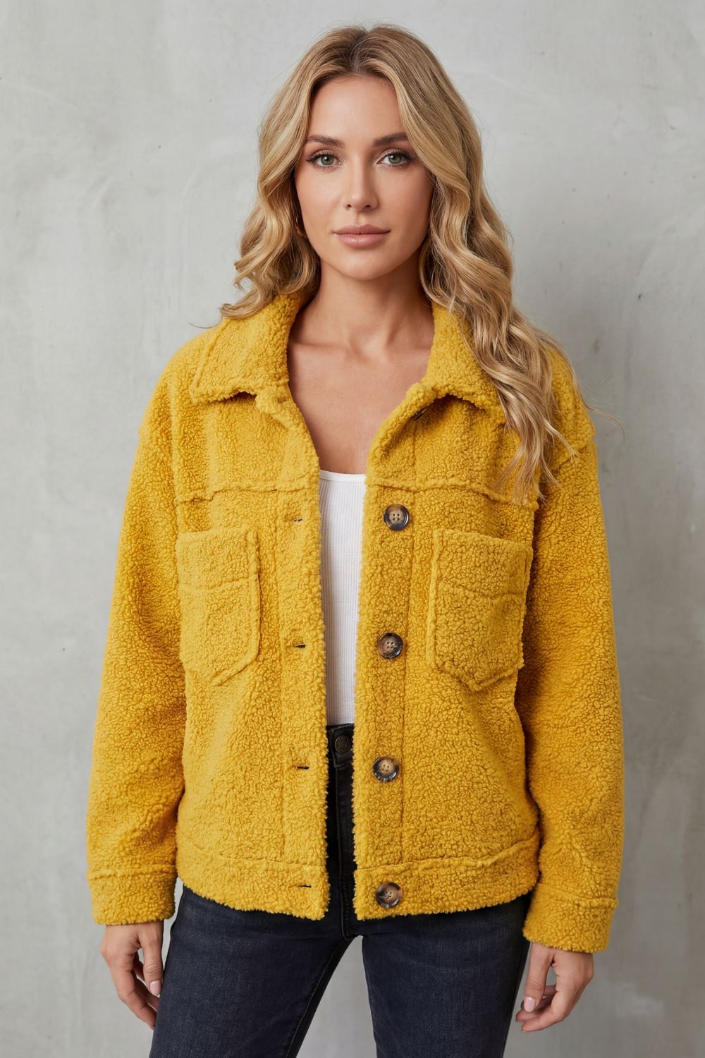 Women's stylish textured button-up jacket, a comfortable and warm layering piece for any casual look.