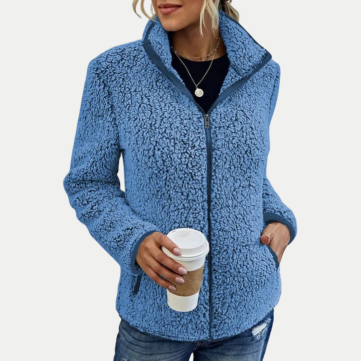 Women's cozy textured fleece zip-up jacket with high collar for fall & winter everyday wear.