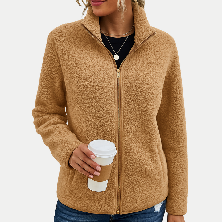 Casual women's textured zip-up fleece jacket, ideal fall outerwear for warmth & everyday comfort.