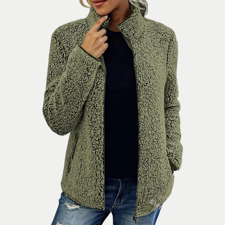 Stylish women's long-sleeve textured fleece jacket, offering a comfortable fit & warm winter layering.