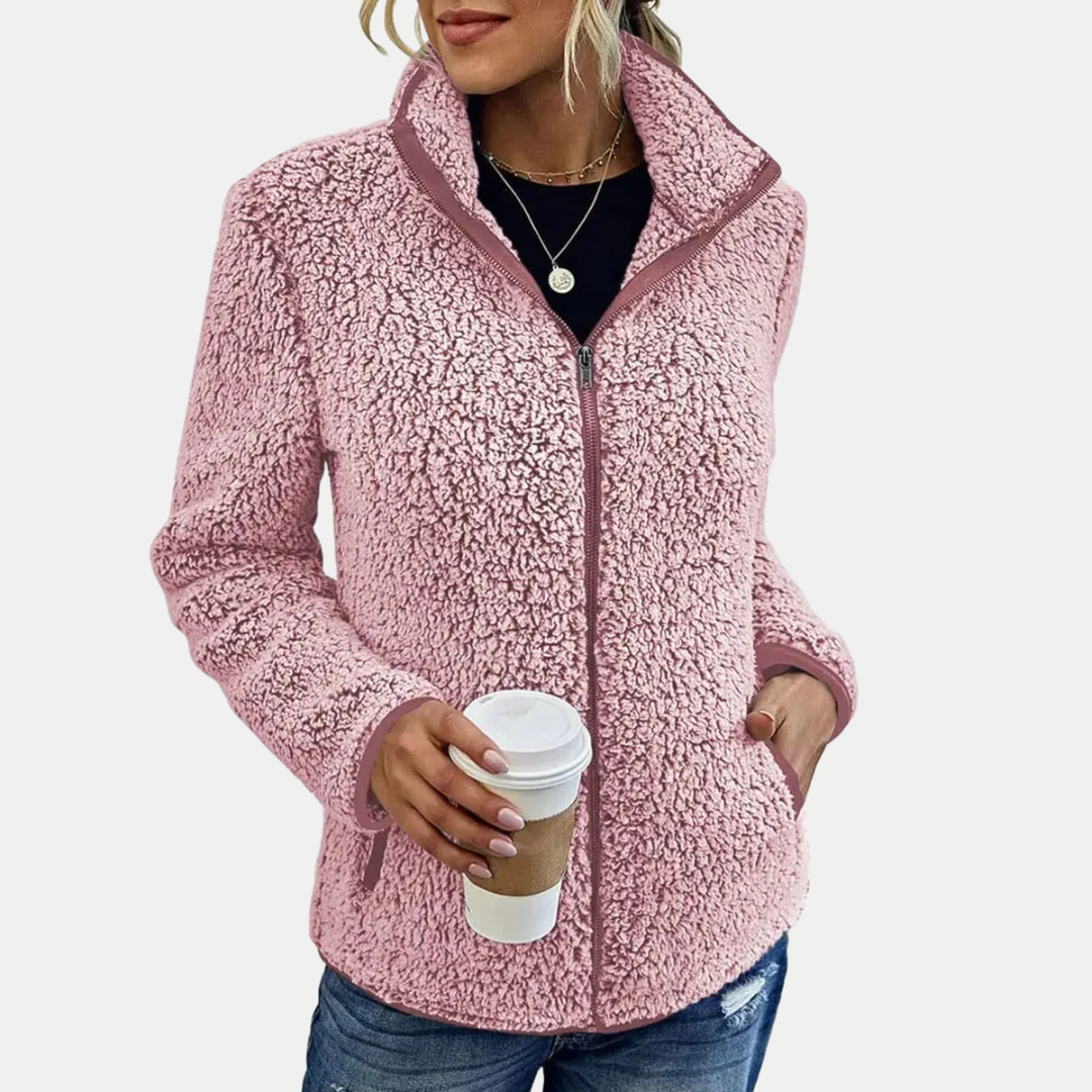 Warm & cozy women's high-collar zip-up fleece jacket, essential outerwear for cold fall & winter days.