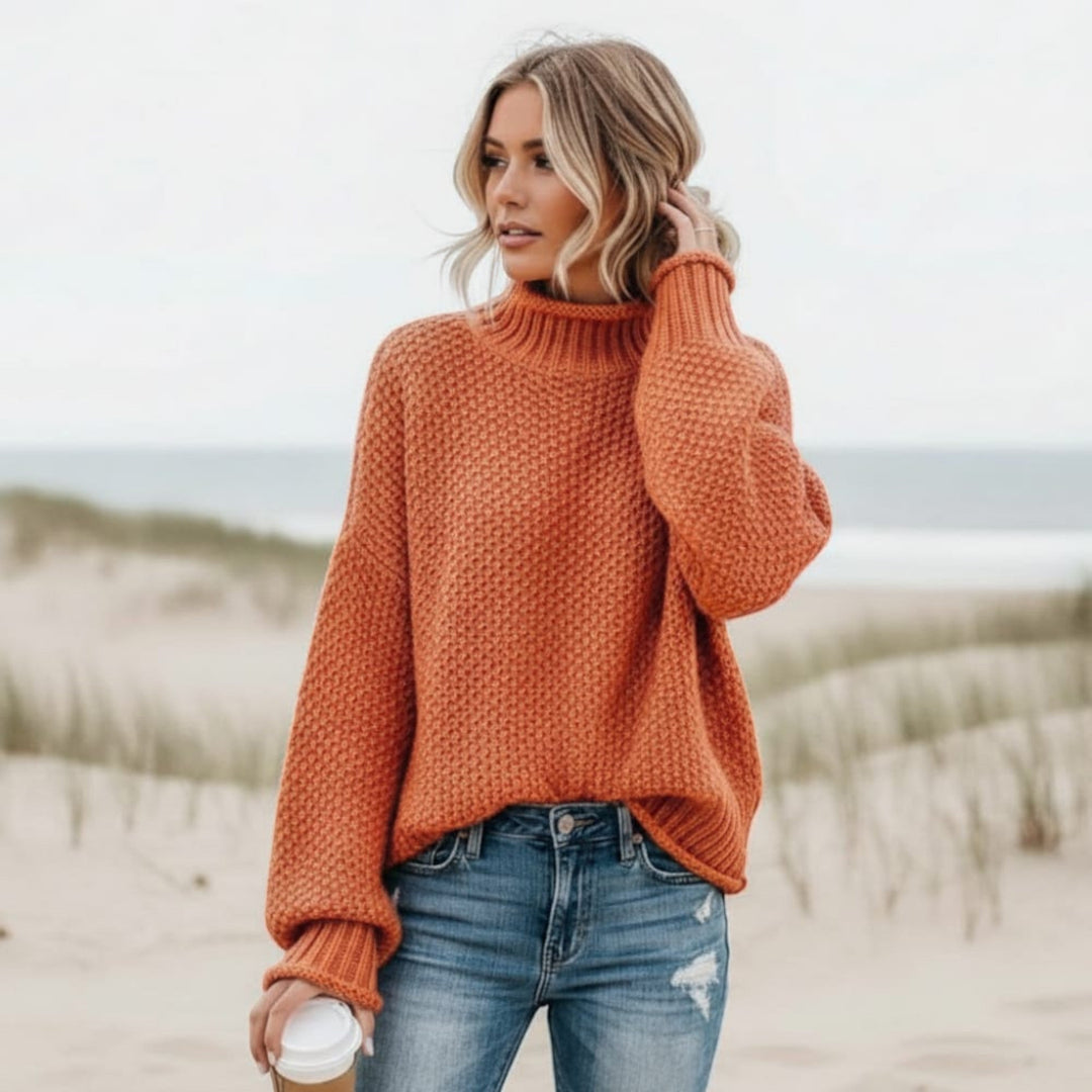 Women's cozy turtleneck pullover sweater. Relaxed fit, long sleeve for fall & winter comfort.