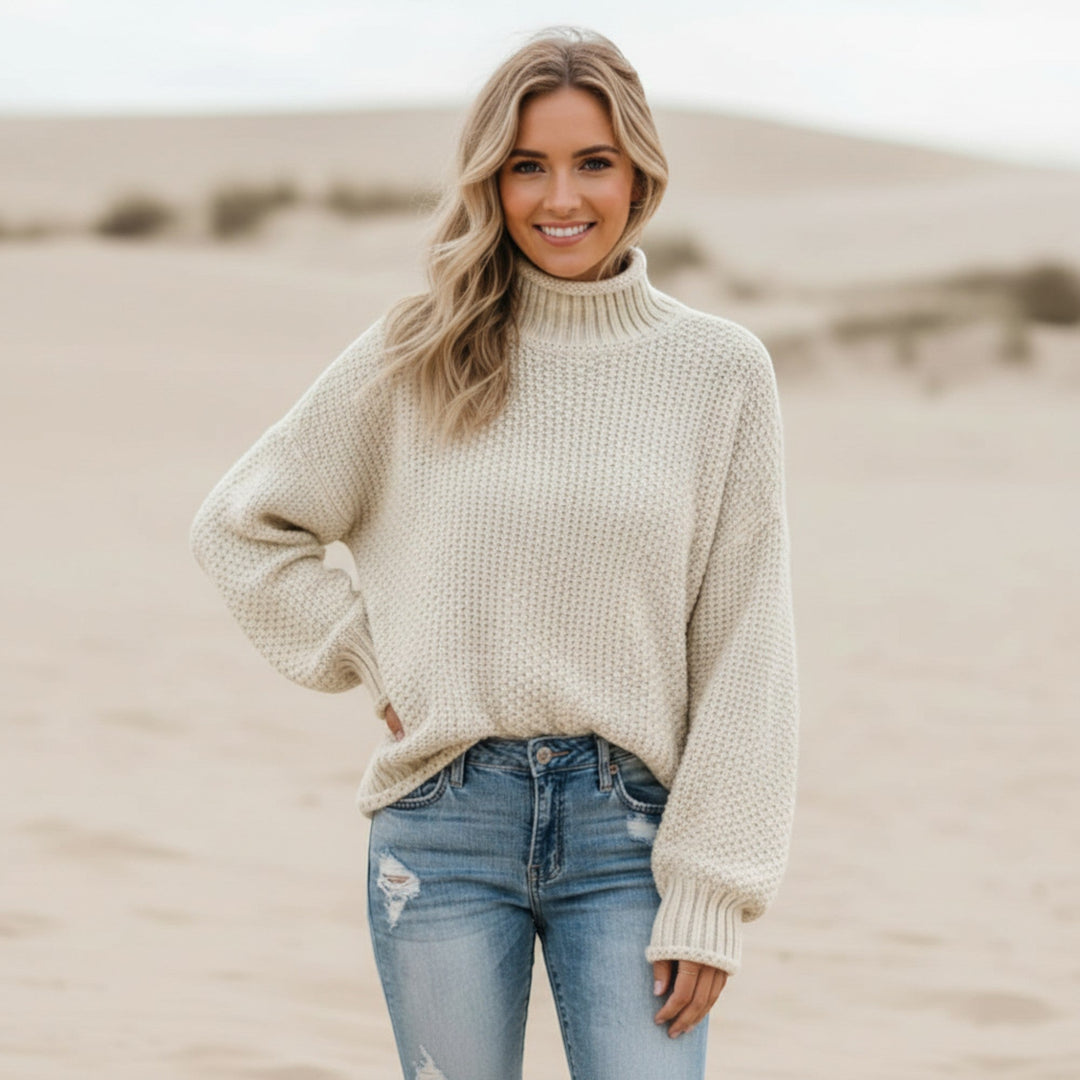 Chic women's winter style sweater. Long sleeve, warm turtleneck pullover, relaxed fit comfort.