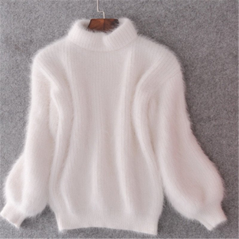 Close-up of a soft, cozy knit women's turtleneck sweater, ideal for comfortable winter and fall wear.