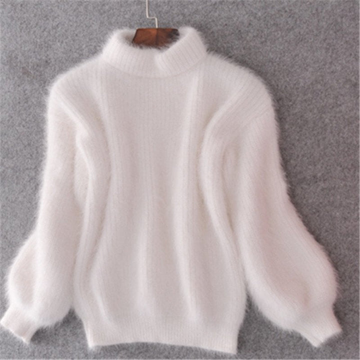 Close-up of a soft, cozy knit women's turtleneck sweater, ideal for comfortable winter and fall wear.