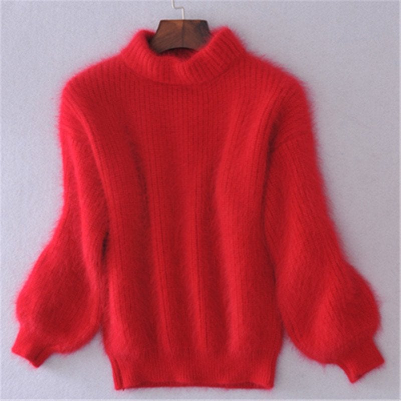 Elegant women's turtleneck sweater featuring a cozy, warm knit and comfortable relaxed fit for winter style.
