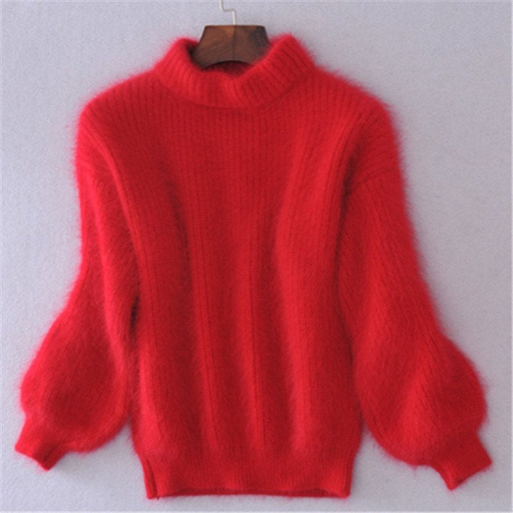 Elegant women's turtleneck sweater featuring a cozy, warm knit and comfortable relaxed fit for winter style.