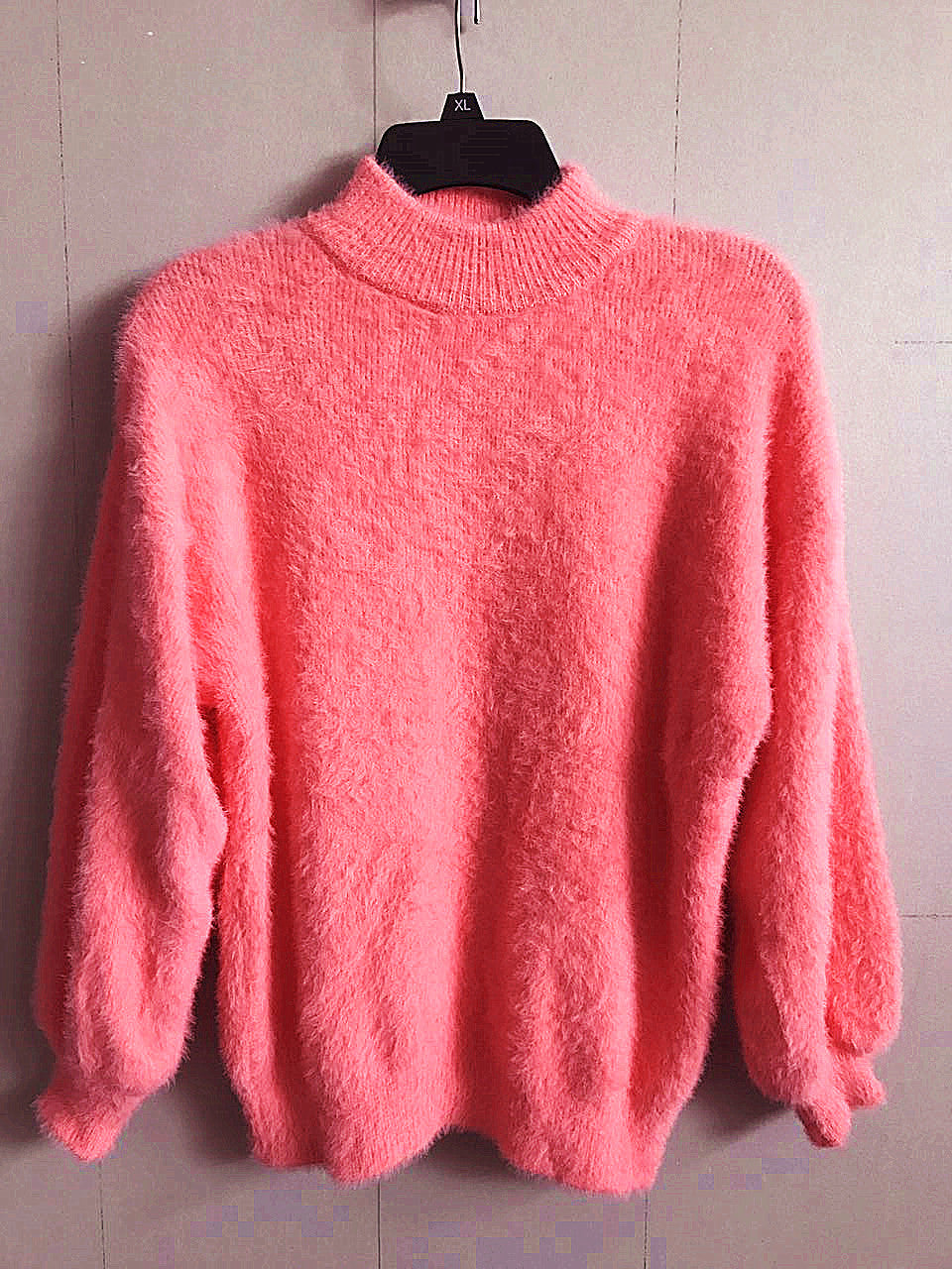 Chic women's cozy turtleneck sweater, a versatile long sleeve knit for elegant and warm winter fashion.