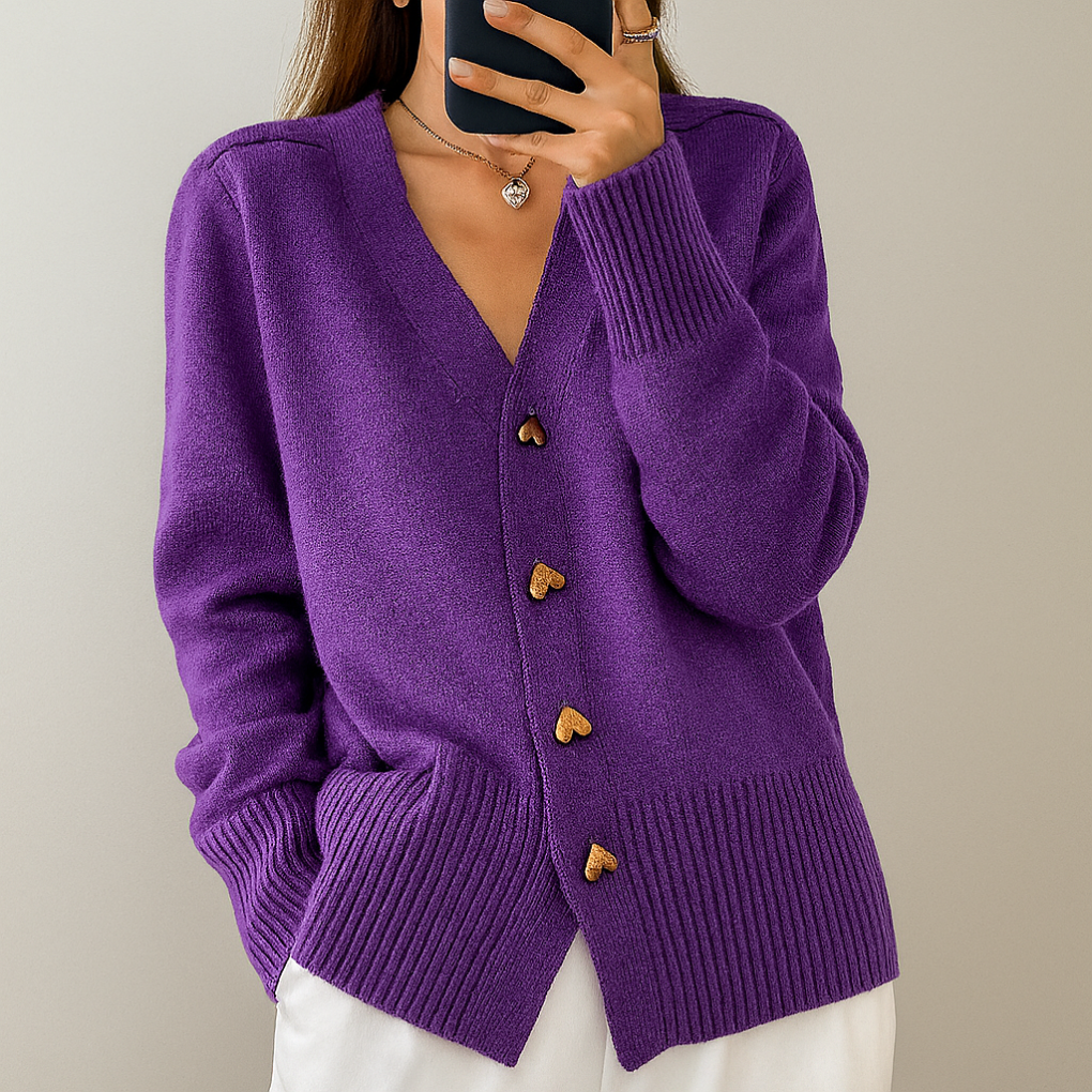 Chic women's V-neck knitted cardigan. Perfect for casual cozy wear & a versatile autumn outfit. Button front detail.