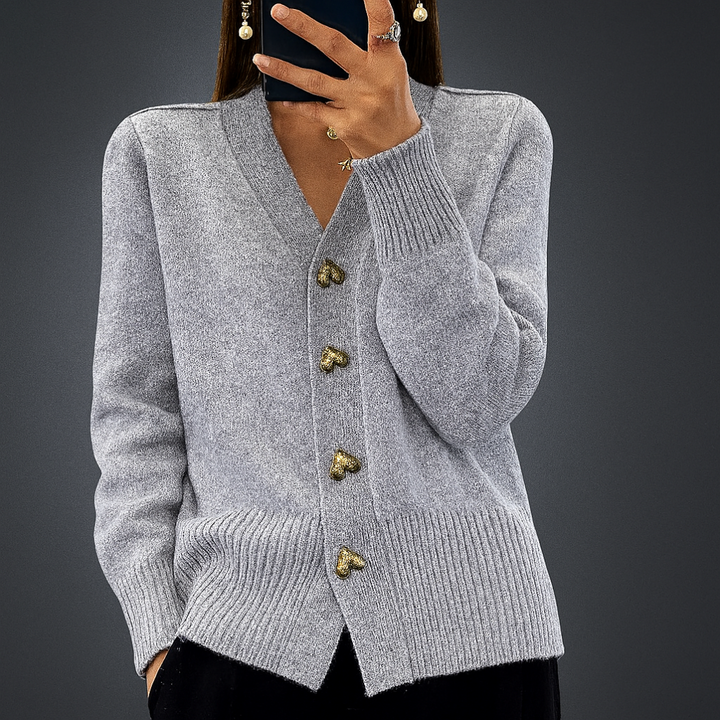 Comfortable women's cozy knit V-neck cardigan. Essential layering piece, perfect for cool weather and winter style.
