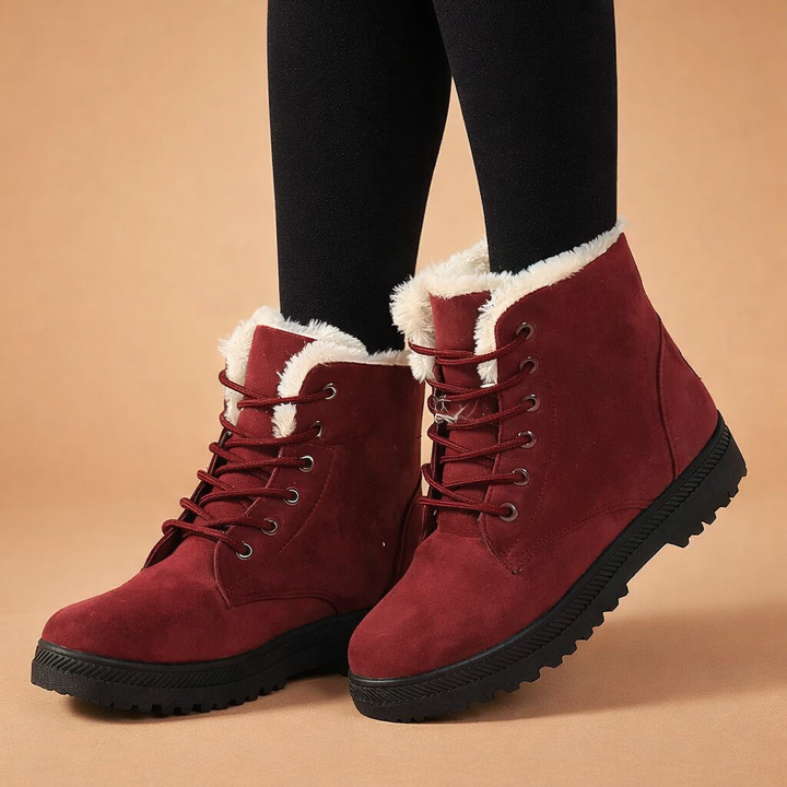 Fashionable women's lace-up ankle boots, warm and supportive for everyday winter wear.