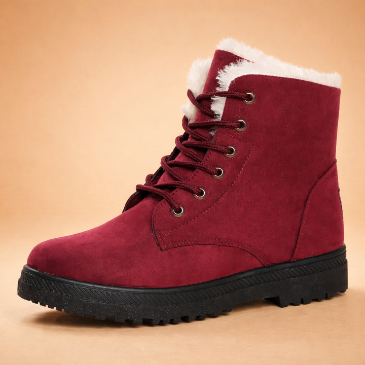 Women's warm lace-up winter ankle boots, cozy and supportive for cold weather fashion.