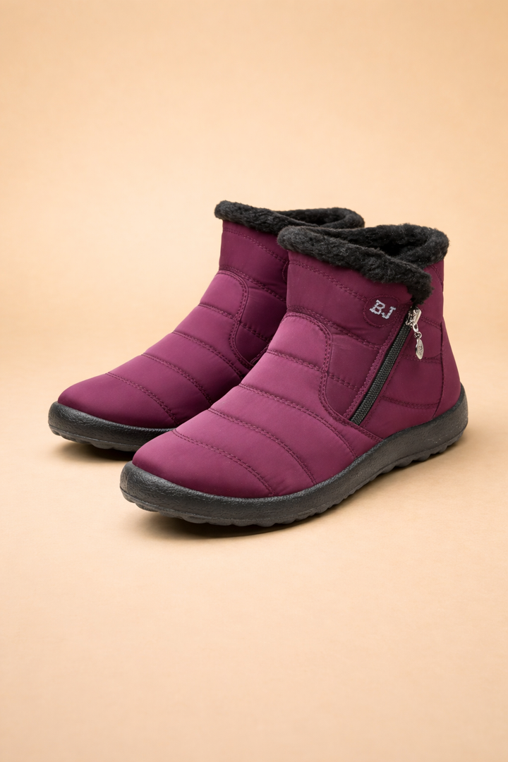 Stylish women's non-slip winter snow boots, waterproof & cozy for warm, dry comfort in cold weather.