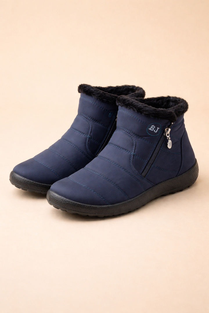 Fashionable women's waterproof snow boots, cozy & non-slip, perfect for winter comfort & cold weather style.