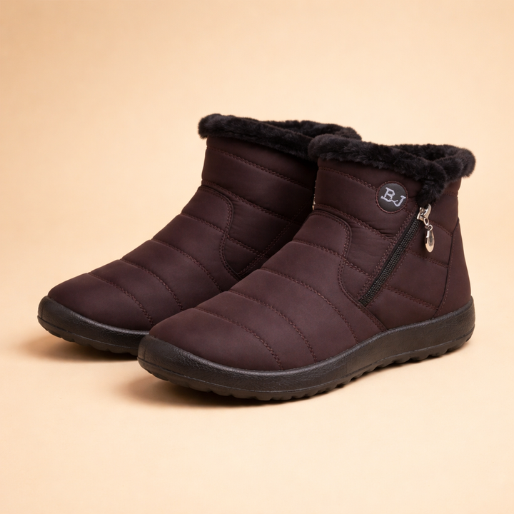 Durable women's waterproof snow boots, cozy warm lining & non-slip grip for secure winter walking.