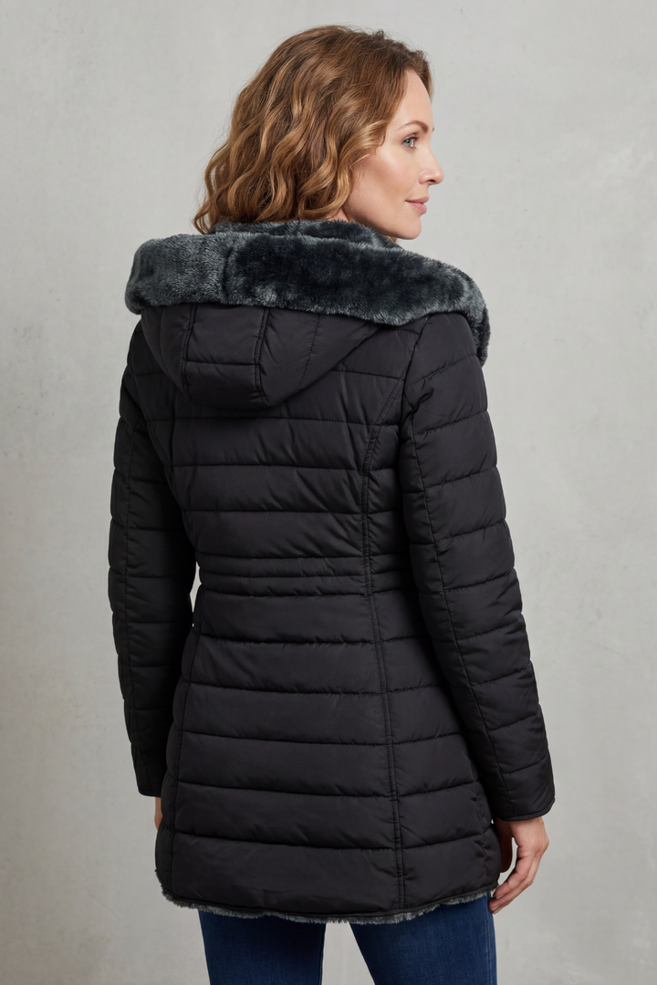 Plush women's cozy winter parka jacket, designed for ultimate warmth & comfort in cold weather. Fashionable.