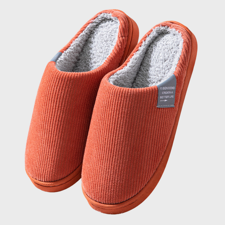 Warm women's indoor slippers featuring a non-slip sole for secure footing and cozy fall winter comfort at home.