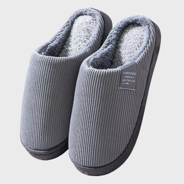 Slip-on women's cozy slippers, ideal for warm feet and ultimate comfort indoors during the fall and winter months.