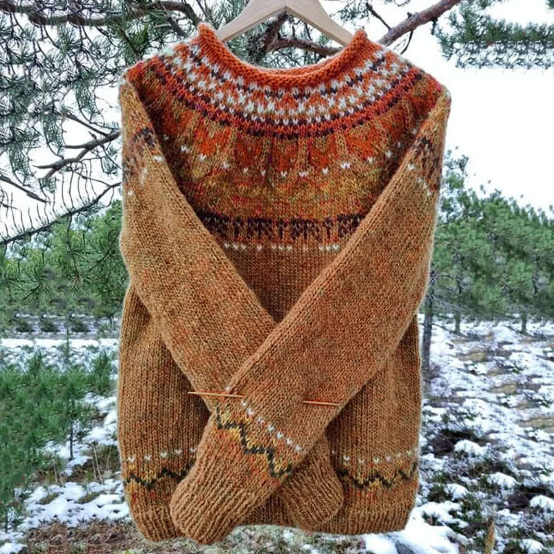Close-up of a women's cozy winter sweater, showing soft texture and stylish design for ultimate warmth.