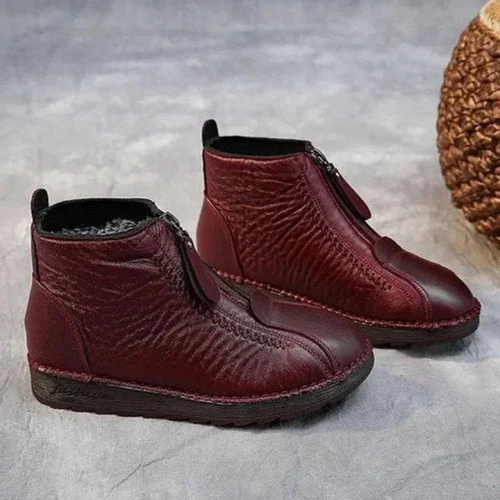 Women's round toe zip-up ankle boots with a durable slip-resistant sole, ideal for winter & cold weather.