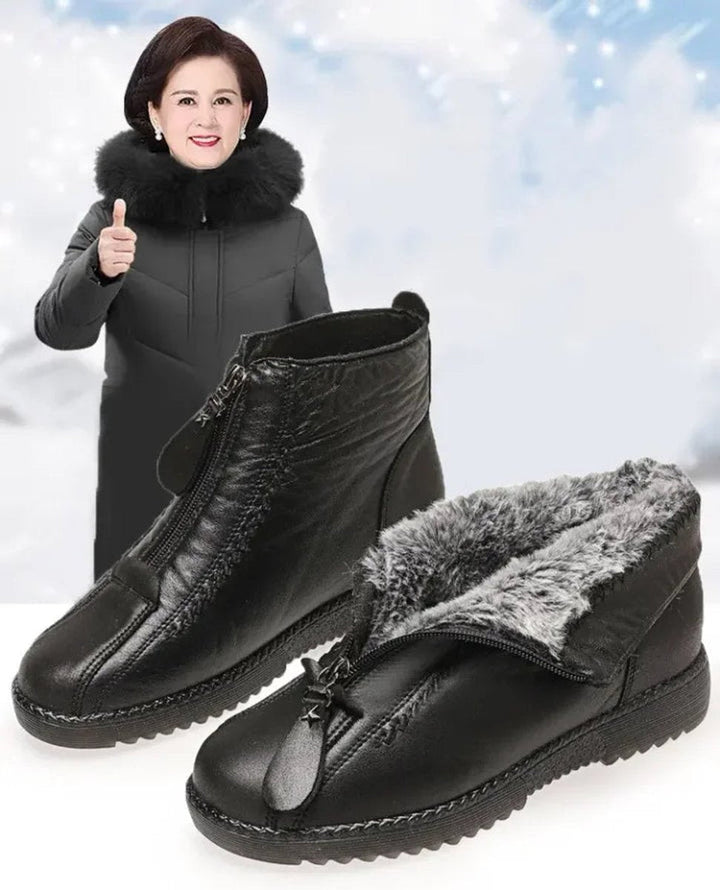Stylish women's cozy zip-up ankle boots. Slip-resistant, waterproof & warm for everyday winter comfort.